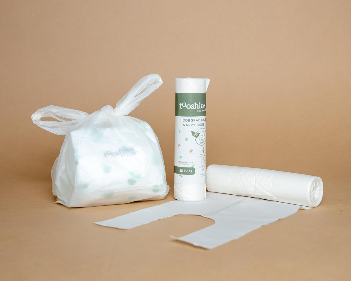 Tooshies Eco Nappies Size 1 Newborn, 104 Count + Biodegradable Nappy Bags 40pk + Water Eco Wipes, Pack of 1120 + Change Mats 10pk