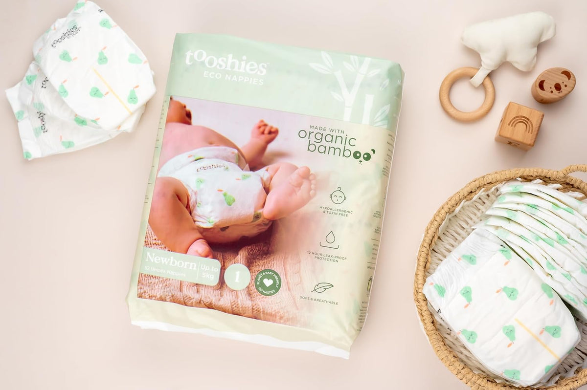 Tooshies Eco Nappies Size 1 Newborn, 104 Count + Biodegradable Nappy Bags 40pk + Water Eco Wipes, Pack of 1120 + Change Mats 10pk
