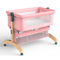 Premium Pink Baby Bassinet Bedside Sleeper with Mosquito Net, Adjustable Height & Wooden Frame