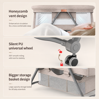 Baby Bassinet Bedside Sleeper with Mosquito Net, Portable Folding Crib, Breathable Mesh Sides, Storage Basket & Lockable Wheels for Newborns and Infants,Grey