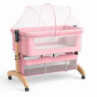 Premium Pink Baby Bassinet Bedside Sleeper with Mosquito Net, Adjustable Height & Wooden Frame
