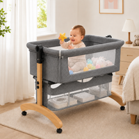 Baby Bedside Bassinet with Adjustable Height & Storage Basket – Portable Co Sleeper Crib with Mesh Sides and Wheels for Newborns