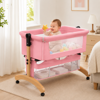 Premium Pink Baby Bassinet Bedside Sleeper with Mosquito Net, Adjustable Height & Wooden Frame