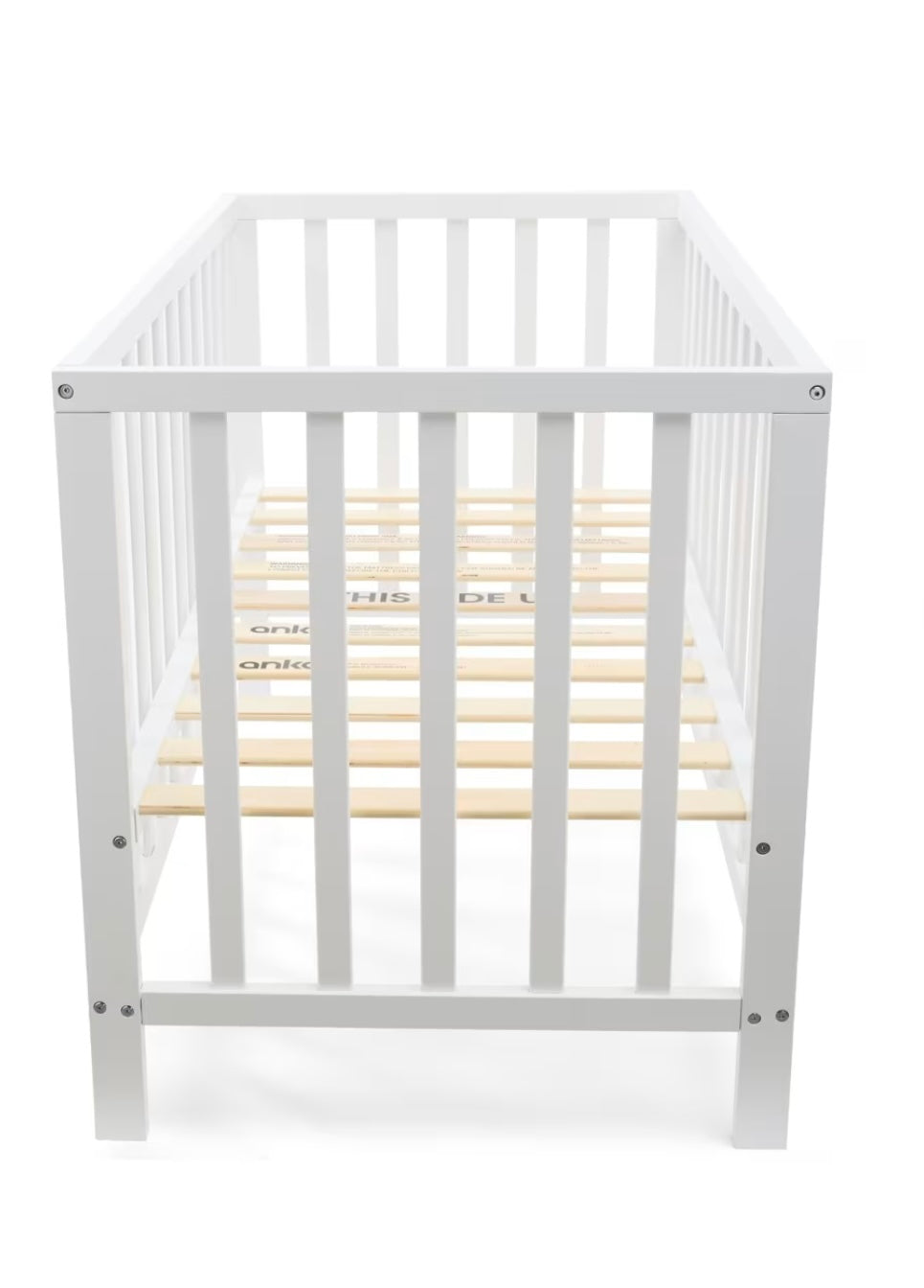 White wooden cot