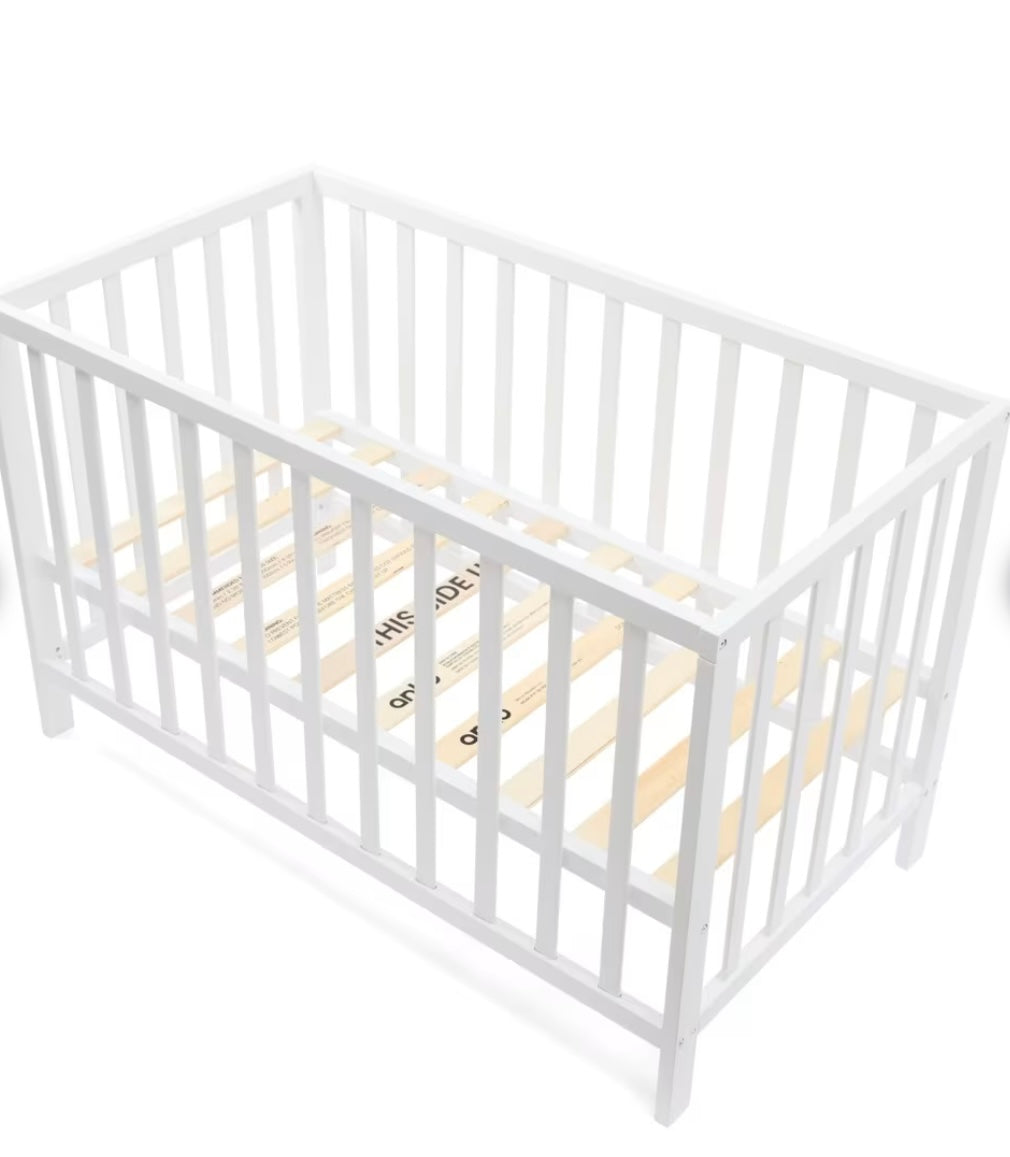 White wooden cot